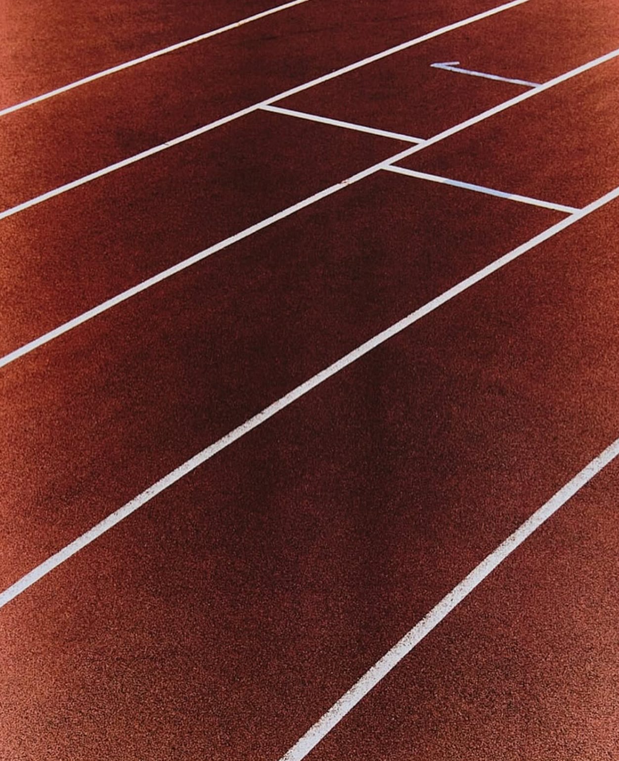 Archival red running track lane lines